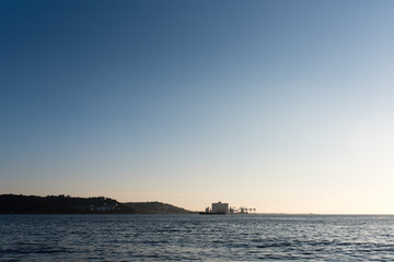 Fototapeta premium mouth of the Tagus river, lisbon, portugal, on sunset