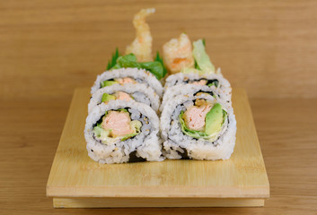maki roll with shrimps fried, avocado and lattuce © MandriaPix