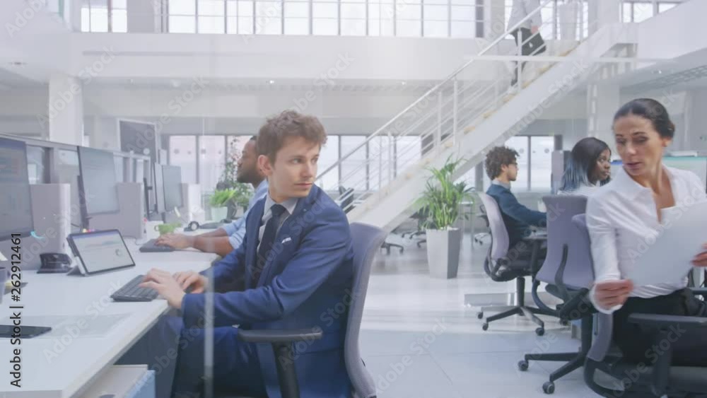 Aufkleber young handsome manager wearing a suit and tie discusses work with his beautiful colleague specialist