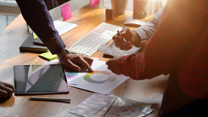 Team graphic designer creative at desk in studio