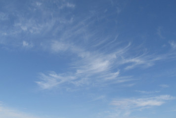The real blue sky with a few white cirrous clouds