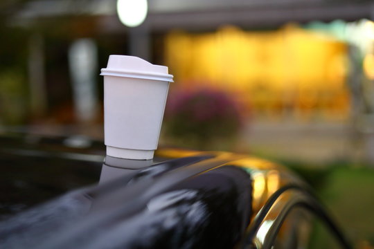 Takeaway Coffee Cup Put On Black Car Road Trips