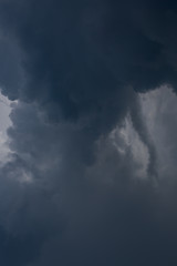 heavy storm cloud on dramatic moody dark sky