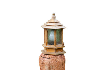 Outdoor lamp on stone decorative in garden isolated on white background.