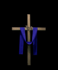 Wooden cross draped with purple fabric and thorns - 262925092