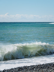 Seascape with waves and clear sky.