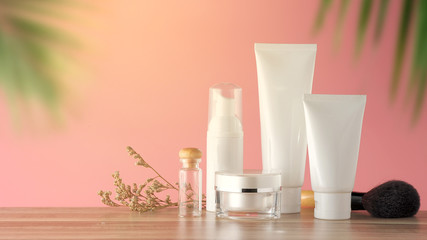 Set of cosmetic sun block on a blue with sunlight background. Cosmetic package for natural beauty blank label branding mock-up concept.