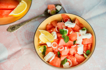 Summer light salad of watermelon, lime, mint and cheese