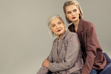 Positive nice women taking part in the photo shoot