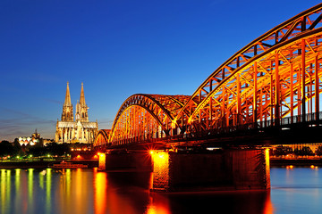 Beautiful night with hohenzollern bridge and cathedral in Cologne, Germany