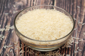 A glass bowl with white long-grain rice