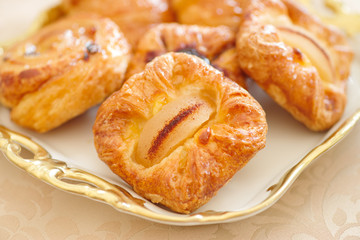 croissant with jam on a plate