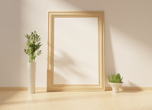An empty wooden frame on the wooden floor with plants. Mock up for pictures, photos, images, lettering. 3D rendering.