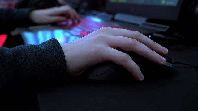 Online lesson. Distance learning. Group Video Chat, Conference. Gamer playing a computer game. Work at home. eSports. Championship in computer games. Online shopping. Keyboard neon light.