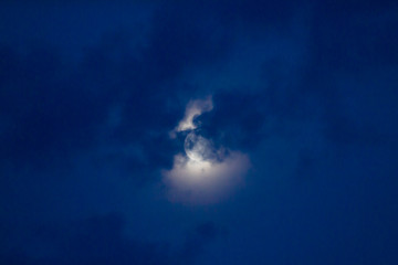 Naklejka na ściany i meble Bright night sky with moon and clouds