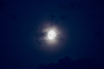 Fototapeta na wymiar Waxing Gibbous moon with clouds