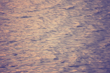 beautiful water wave pattern sunset with nice harmonic structure and reflections