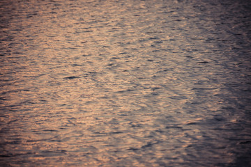 beautiful water wave pattern sunset with nice harmonic structure and reflections