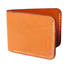 Leather accessories on a white background, wallets, coin boxes and straps, isolated