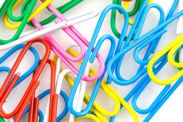 Bunch of colorful paper clips isolated