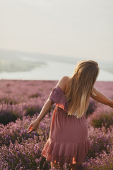 Fototapeta na wymiar Woman in the lavender field