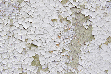 White cracked paint on the wall texture