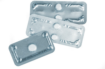 Emergency contraceptive pills in blister pack on blurred background of morning after pills. Drug...
