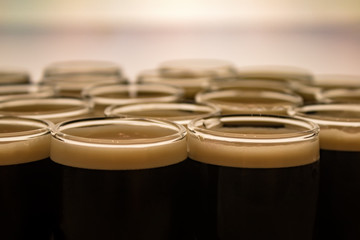 A closeup picture of a black beer