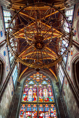 Obraz premium Vienna, Austria - 2 April 2019: stained glass window in famous Votiv Church (Votivkirche)
