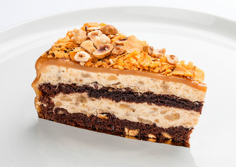 Treugolnic a piece of banana cake on white background