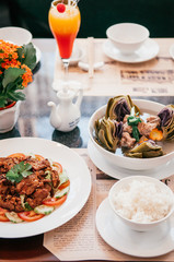 Artichoke soup with pork ribs and fried pork with rice