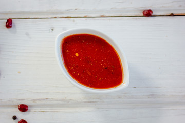 Red salsa, adjika or chatney sauce.