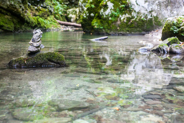 A cairn in the middle of a stream