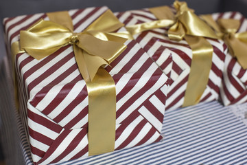 Striped gift box with ribbon.