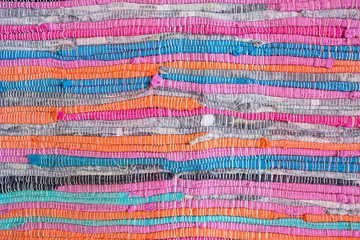 Obraz premium Background from a multi-colored woolen plaid