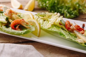 Appetizzers shrimp, salad and lemon. Healthy food. Organic. Diet. Wooden., homemade.