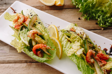 Appetizzers shrimp, salad and lemon. Healthy food. Organic. Diet. Wooden., homemade.