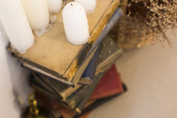 Candle with old book