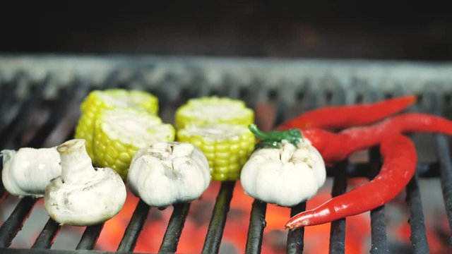 Grilled vegetables corn garlic and chili pepper, garnish restaurant cooking
