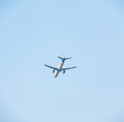 A plane flying in the sky.