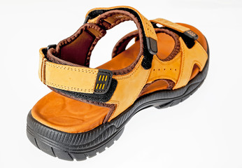 Genuine leather sandals on a white background.