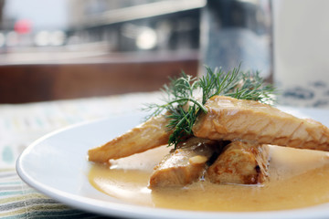 fried fish meal with fresh vegetables