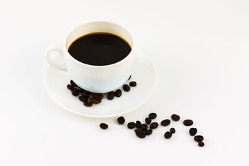 Coffee on white cup and saucer isolated on white background with copy space.