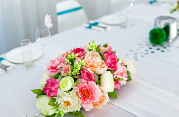 Served tables in restaurants and cafes, meals and drinks on the tables, room design.