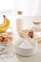 ingredients and tools to make a cake, flour, butter, sugar,eggs