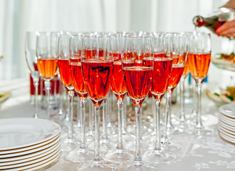 Served tables in restaurants and cafes, meals and drinks on the tables, room design.