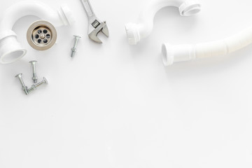 Professional instruments for plumber on white background top view space for text