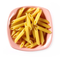 Penne rigate pasta in bowl isolated on white background, top view