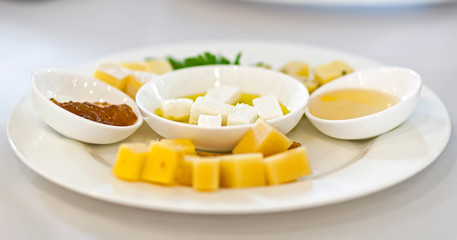 Served tables in restaurants and cafes, meals and drinks on the tables, room design.