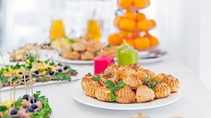 Served tables in restaurants and cafes, meals and drinks on the tables, room design.